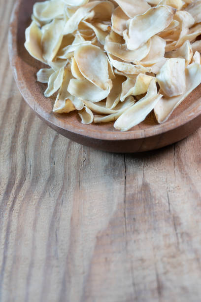 istock chinese medicine dried lily bulb on wooden table 2192933142