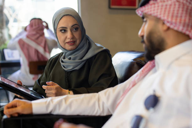 istock Two Arab business professionals having meeting in cafe 2192933518