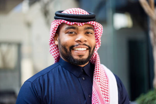 istock Saudi man in traditional attire smiling in office 2192933892