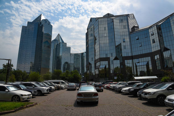 Nurly Tau Almaty multifunctional complex is a huge complex with office and residential builsings. The construction startet in 2005 some of the buildings where completed in 2024. Captured during summer season.