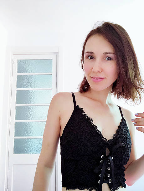 istock Nice beautiful brown-haired girl, smiling and taking a selfie. 2192935867