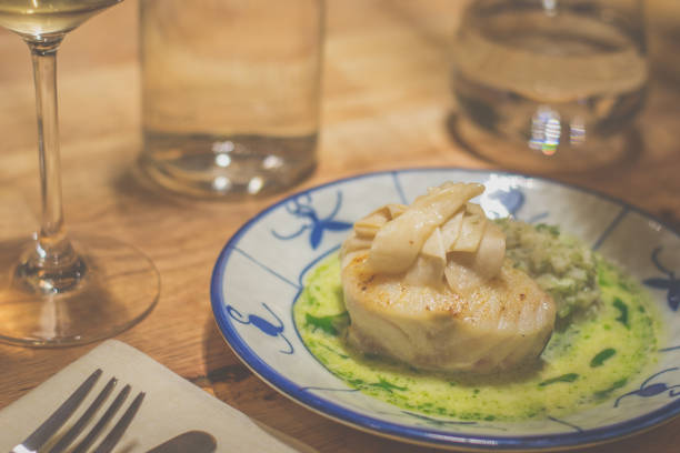 istock Atlantic cod, mushrooms, fennel compote, horseradish sauce served in a plate 2192939848