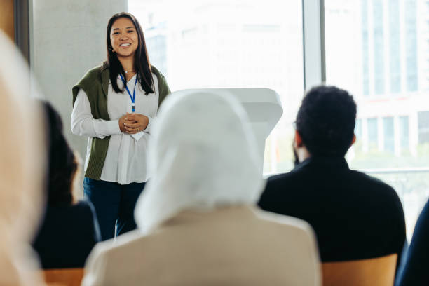 istock Woman leading a business presentation at a conference event 2192946270