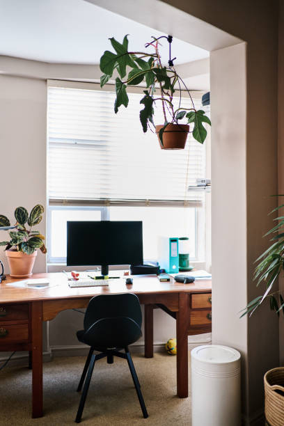 istock Minimalist home office with computer monitor on desk 2192947880