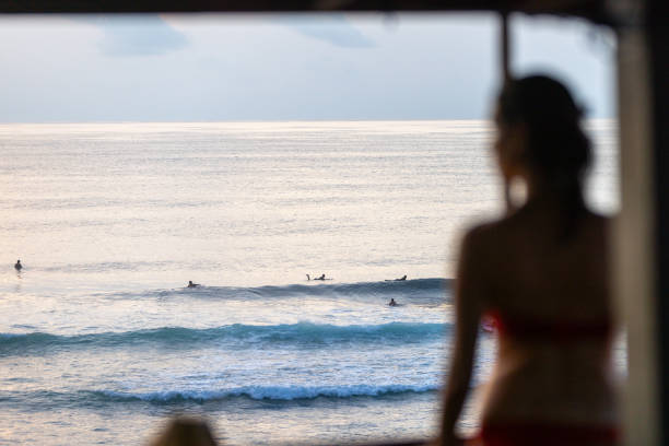 istock Unrecognizable woman is looking at sunset view. 2192948612