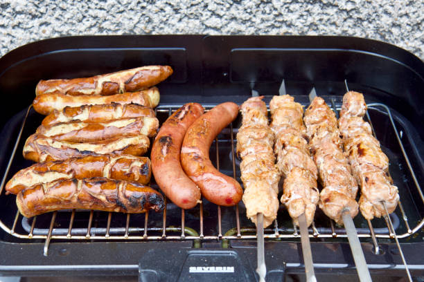 BBQ, barbecue, meat, shashlik, grilled sausages. High quality photo.