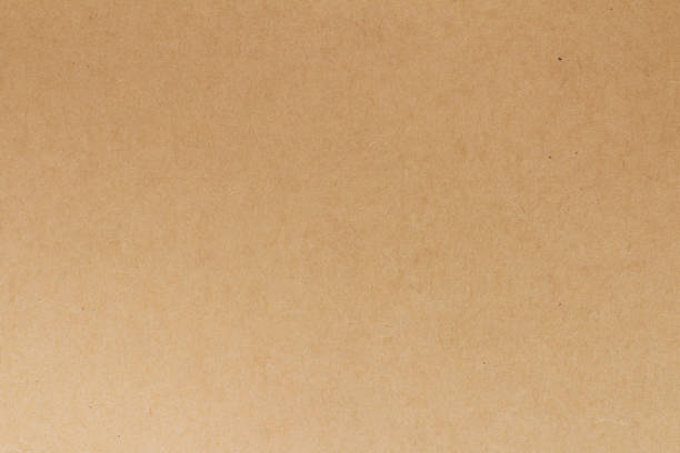 istock Cardboard sheet texture background, pattern of brown kraft paper with vintage style. 2192950529