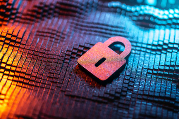 istock Close-Up of a Red Lock on Abstract Technology Background 2192950962