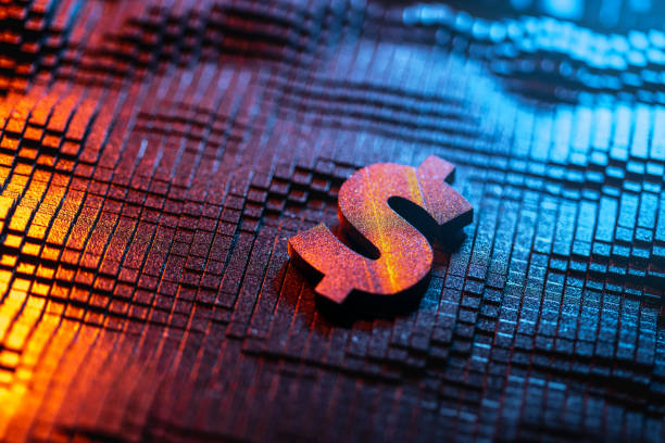 istock Close-Up of a Glowing Dollar Symbol on a Digital Background 2192951006