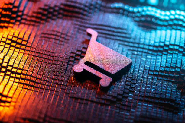 Shopping cart symbol over geometric surface exposed to vibrant orange and blue digital neon lighting, representing e-commerce, online shopping, digital retail, and technology advancements in modern commerce.