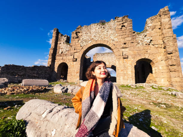 istock A young traveler in front of the basilica in Aspendos 2192951666