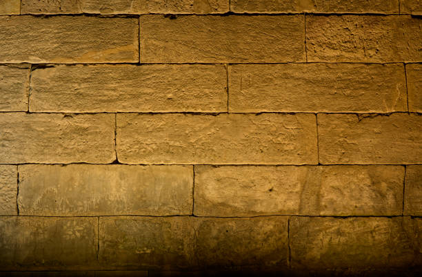 A sunk-relief depiction of a caravan of dromedaries on the north facade of the Temple of Debod. Madrid, Spain.