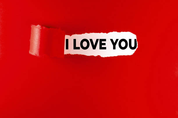I love you message on red paper, torn. Valentine's Day concept. Right above the frame