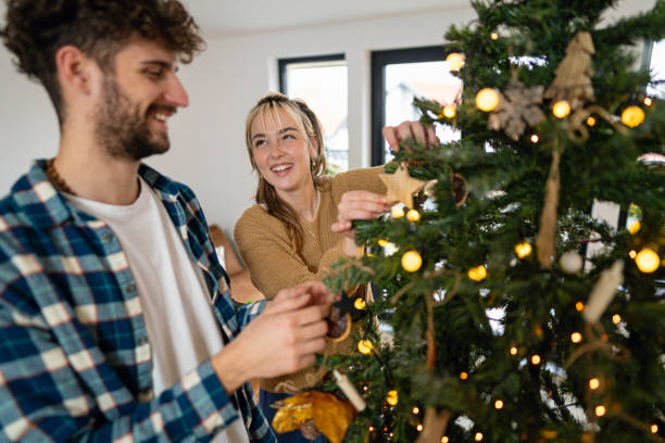 istock A couple enjoying the magic of Christmas while decorating the Christmas tree 2192958249