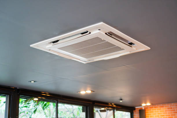 istock Modern ceiling mounted cassette type air conditioning system in coffee shop 2192960203