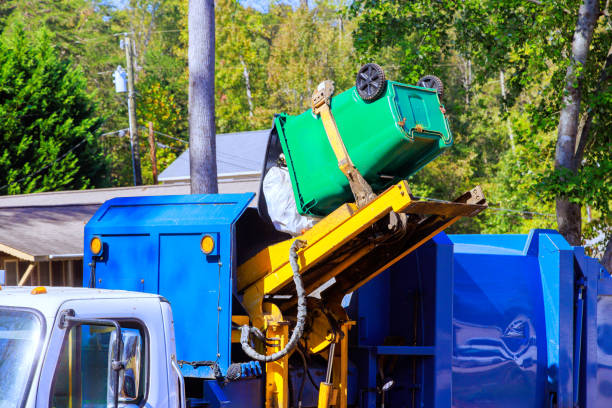 istock Removal of garbage by municipal cleaning services by loading mixed household waste into a garbage trucks 2192960420