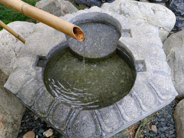 istock A Japanese fountain in a decorative park. 2192962611