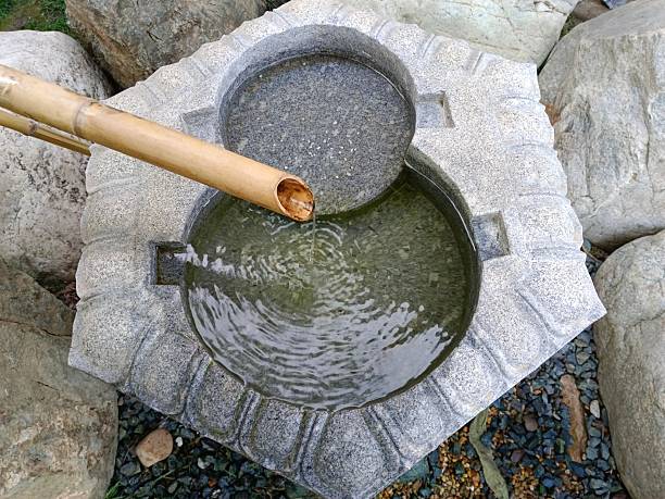 istock A Japanese fountain in a decorative park. 2192962646