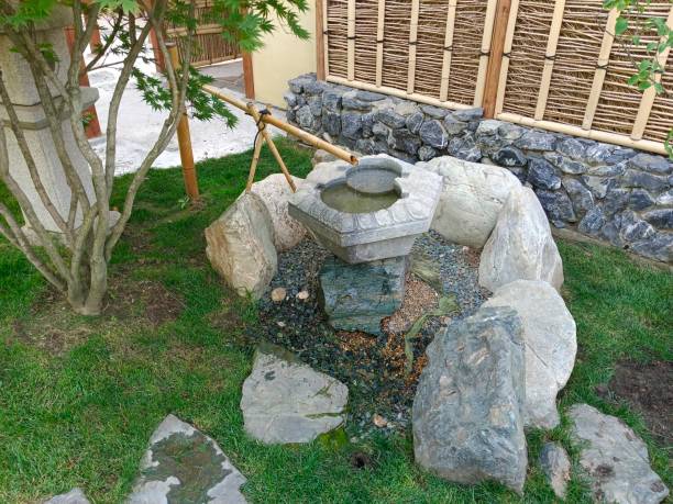 istock A Japanese fountain in a decorative park. 2192962656