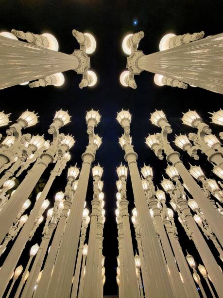 Lanterns from below in contrast to the night sky and a star