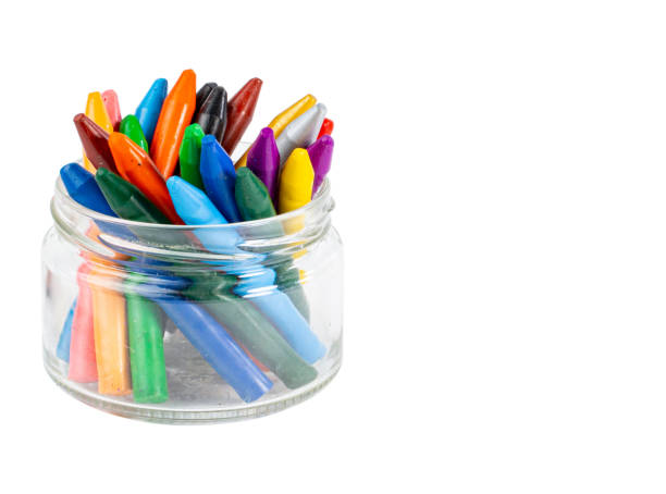 istock Colorful markers in a glass jar ready for creative projects on a bright work desk 2192965571