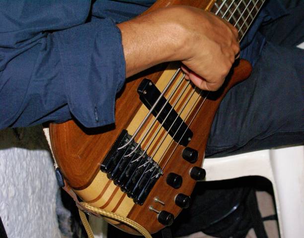 istock guitar in the hands of its performer 2192967891