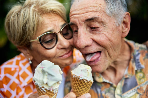 Senior couple enjoying their ice cream cones