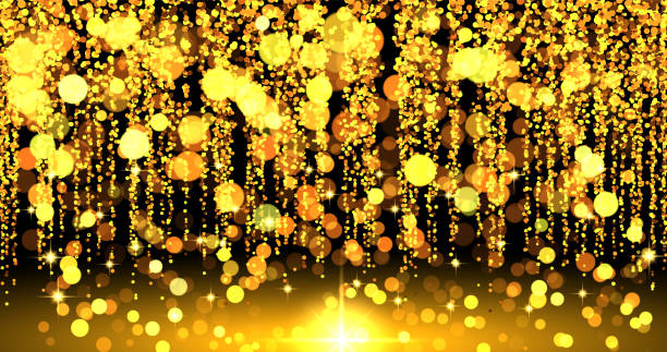istock Golden glitter and sparkling stars create a festive Christmas background. Perfect for a Merry Christmas and Happy New Year greeting card, radiating warmth and holiday cheer. 2192971137