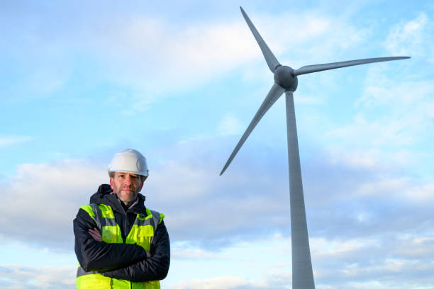 istock Technician in front of wind turbines in wind park 2192971852
