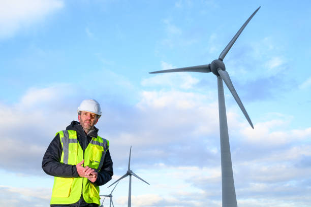 istock Technician in front of wind turbines in wind park 2192971945