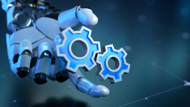 istock Futuristic Robotic Hand Holding Blue Gears on Digital Background 2192972555