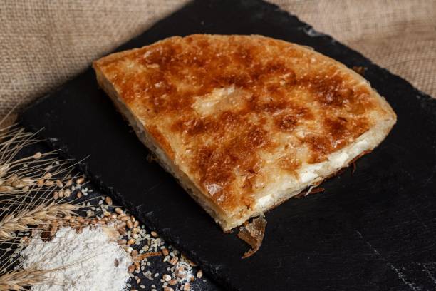 istock Crispy golden-brown pastry on slate 2192973235