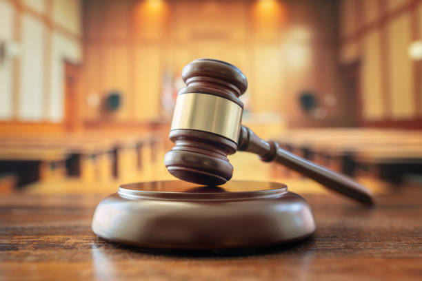 Judges gavel in courtroom legal trial and law background Judges gavel in court room legal trial and law background gavel stock pictures, royalty-free photos & images