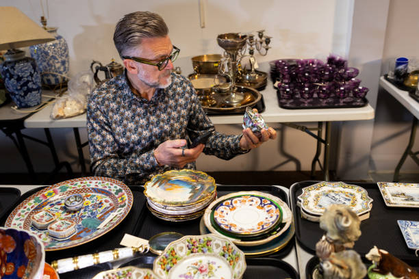 istock Auction Valuer with Antique Collection 2192980112