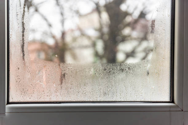 istock Steamy window in the apartment due to moisture and poor ventilation. 2192987169