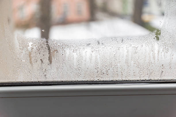 istock Steamy window in the apartment due to moisture and poor ventilation. 2192987173