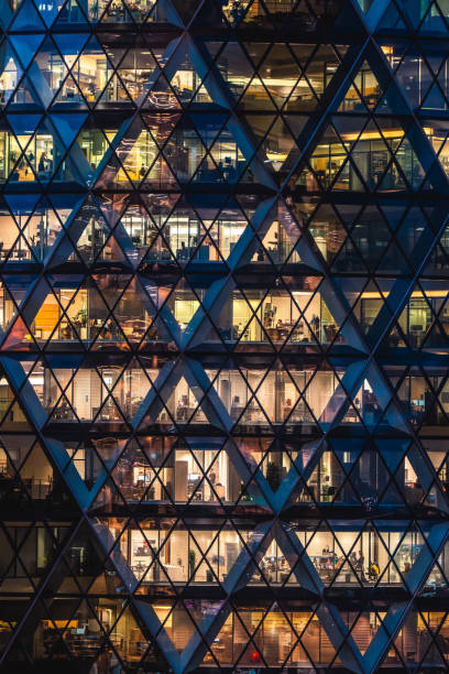 istock Illuminated office buildings in London 2192989149