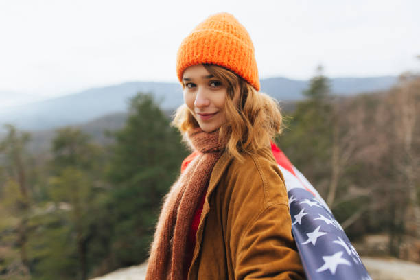 istock Young Cheerful Woman with USA Flag 2192989336