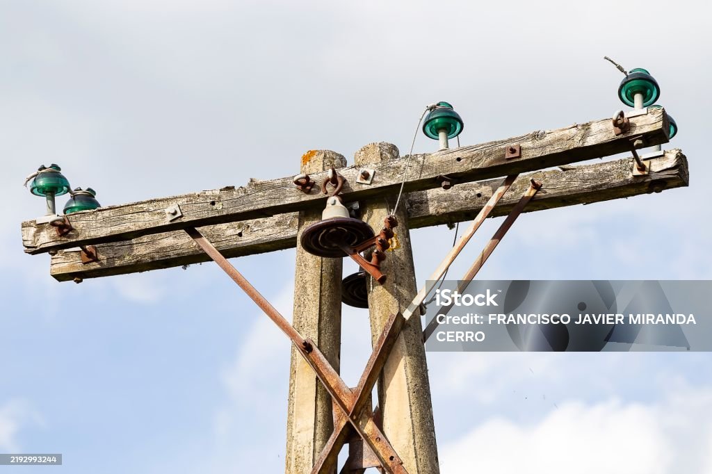 Shell Rot Utility Poles A Rustic Utility Pole With Aged Wood Concrete Rusty Braces And Glass ...