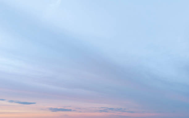 istock Soft pastel clouds in the evening sky create a serene atmosphere, perfect for relaxation and contemplation. 2192994143