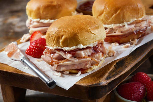 The Famous Cuban Turkey Sandwich from the 1920's - Sliced Turkey Meat, Cream Cheese and Strawberry Jelly on a Sweet Roll