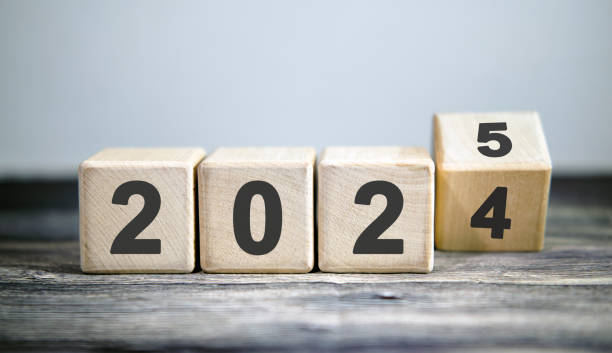 istock New year 2025 concept. Change of year 2024 to 2025, coup. 2192996310