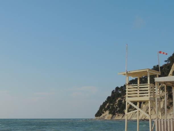 istock lifeguard tower on the seashore against the backdrop of a cliff 2192999383