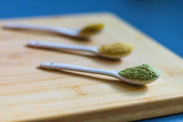 Healthy spices curry, ginger and wheat grass or spirulina.