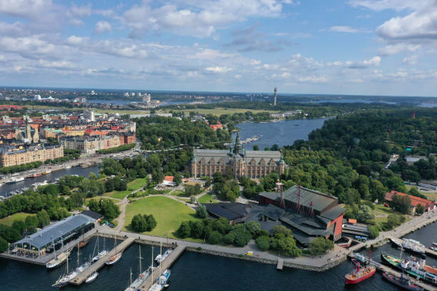 Stockholm, the capital and most populous city of Sweden. The image shows the old town (Nordiska Museet) and ships arround the islands. Captured during summer season as high angle image.