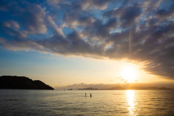 istock Late afternoon in Santos Bay with two stand up paddle boarders 2193001764