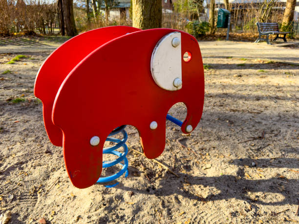 Equipment for a children's playground in Germany on a sunny winter's day.