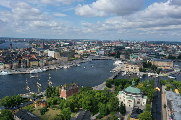 Stockholm, the capital and most populous city of Sweden. The image shows the old town (Gamla Stan) and ships arround the islands. Captured during summer season as high angle image.