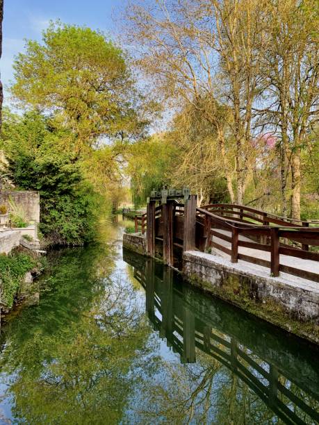 istock stream of a medieval village 2193006161