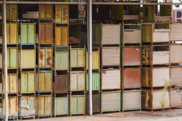 Stacked wooden crates in an organized warehouse setting.